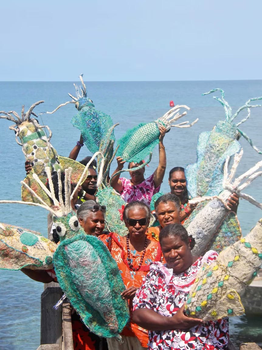 Ghost-net squid and turtle works, community art from recovered nets